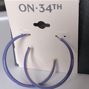 NEW on 34th purple hoop earrings